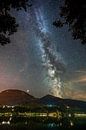 Milky way and night sky in Immenstadt im allgäu above the large Alpsee lake by Daniel Pahmeier thumbnail