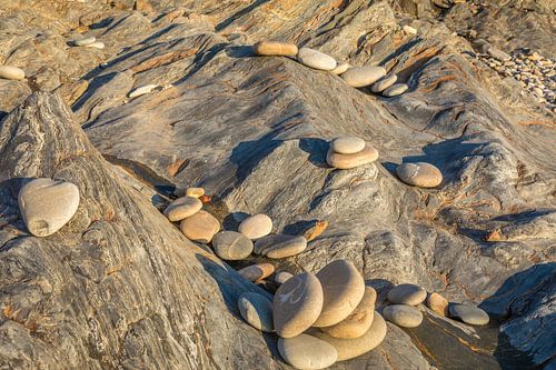 Round stones in the bay of Trez Rouz in Camaret-sur-Mer, Brittany