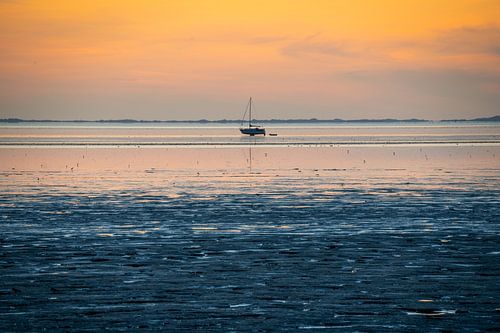 Sailing boat on the mudflats