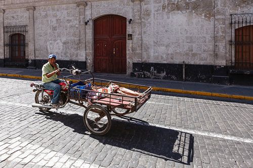 Street scene with motorbike boxcar in Arequipa, Peru by Martin Stevens