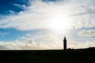 Silhouette d'un phare avec des nuages par Mickéle Godderis Aperçu