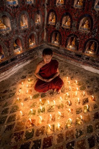 Praying monk at monastery in Nyaung Shwe near Inle in Myanmar by Wout Kok