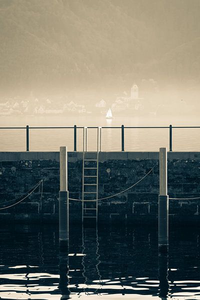 Harbor at Lake Constance in fog with sailboat and in sepia by Andreas Nägeli