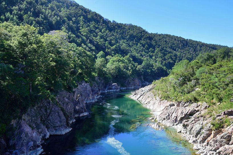 Watching the Buller River from the swing bridge by Frank's Awesome Travels