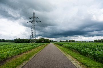 Thunderclouds and electricity pole