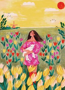 Frau im Tulpenfeld im Frühling