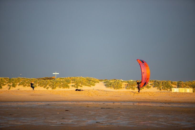 Placing the kite in the water. by Ton Tolboom