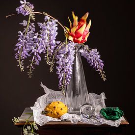 Still life of dragon fruit with wisteria and malachite by Willy Sengers