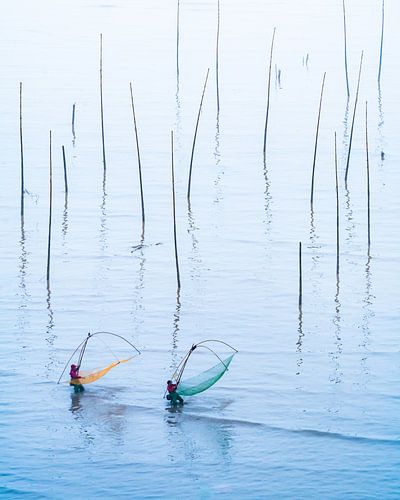 Two Fishermen with their Nets at Low Tide