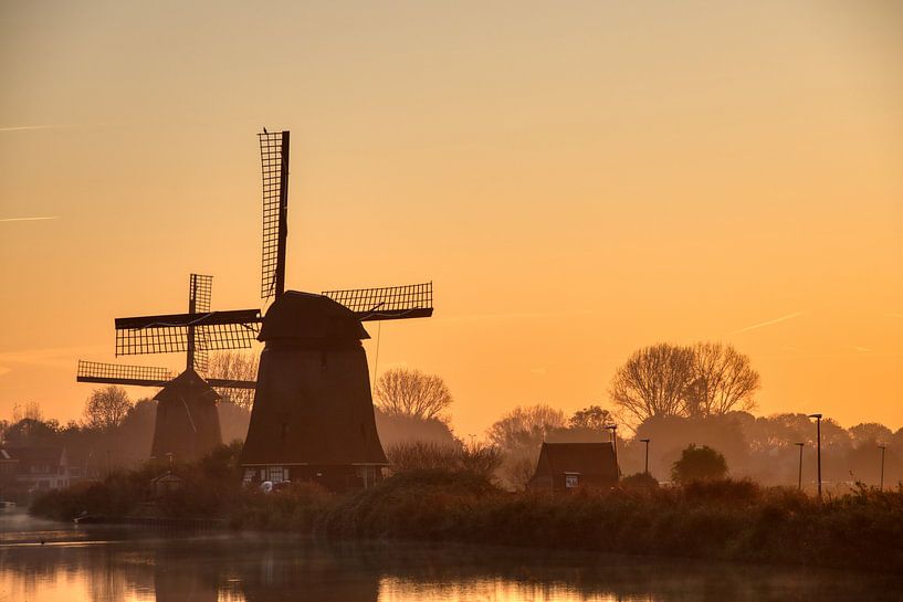 Molens in Alkmaar tijdens gouden uurtje van peterheinspictures