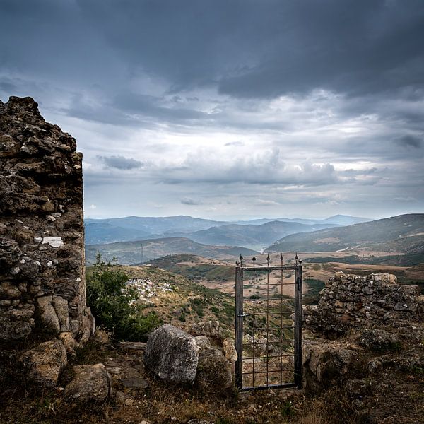 Lonely gate of a ruin in Albania by Sander de jong