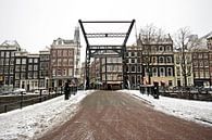 Das verschneite Amsterdam im Winter in den Niederlanden von Eye on You Miniaturansicht