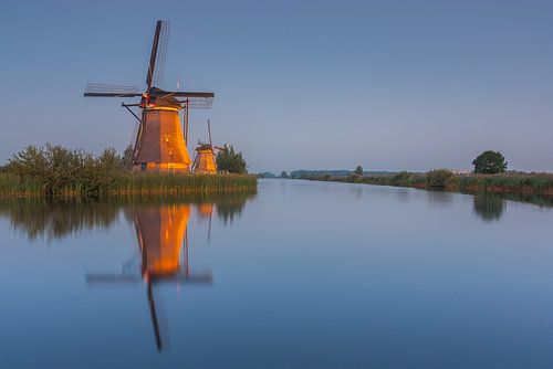 Mills Kinderdijk illuminé sur Ilya Korzelius