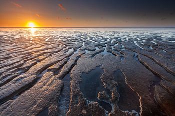 Marée basse et coucher de soleil à Moddergat