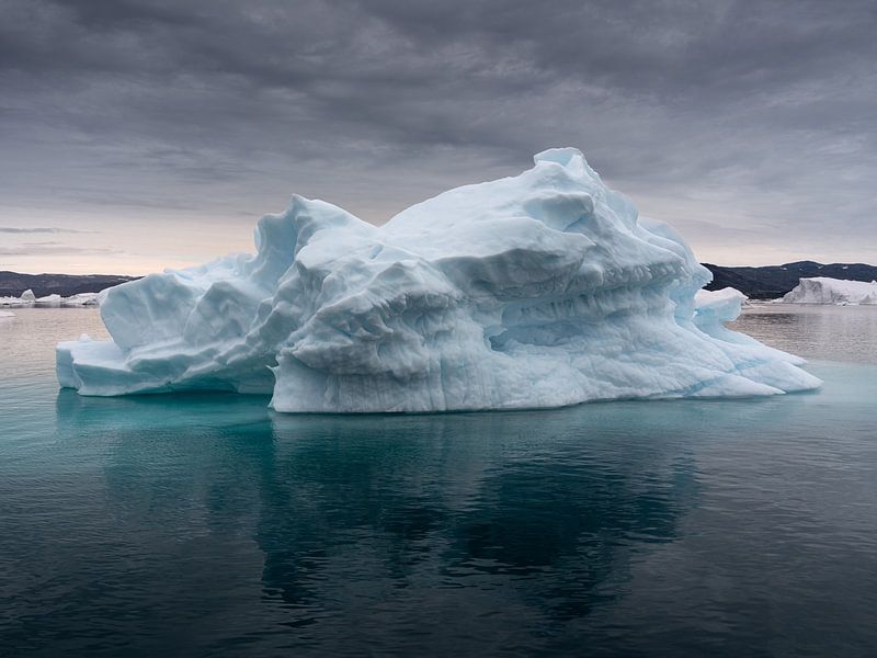 Reflection of a "small" iceberg by Anges van der Logt