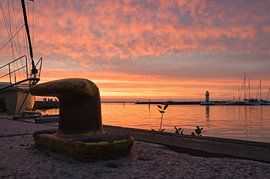 Sunset harbour on Lake Vaettern in Sweden by Martin Köbsch