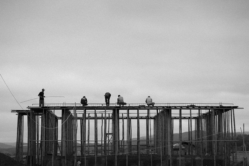 Construction workers in Laos by Floris Verweij