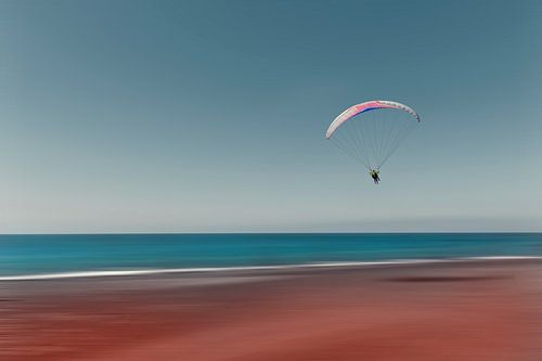 Paragliding over the beach