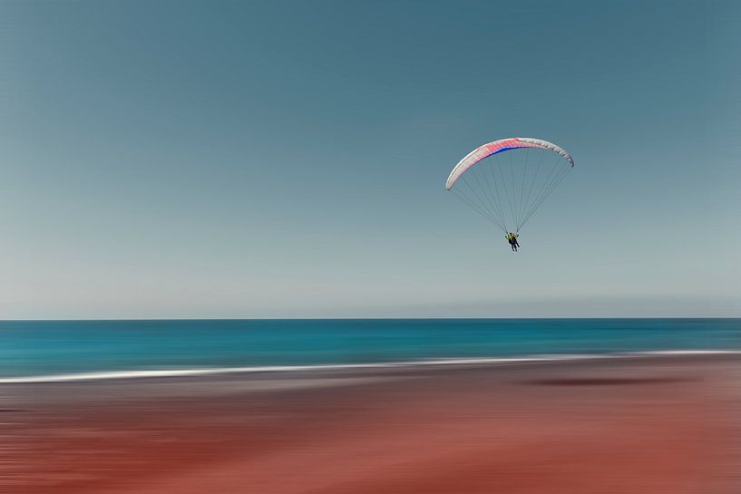 Paragliding over the beach by Dirk Wüstenhagen
