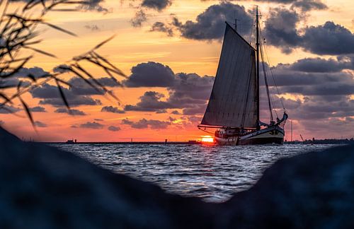 Sailing ship on the Ijsselmeer at sunset