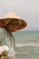 Miss Saigon, vietnamese beach saleswoman.