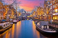 Cityscape of Amsterdam at Christmas on Spiegelgracht in the Netherlands at sunset