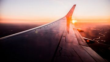 Sunset at cruising altitude by Paul Hemmen