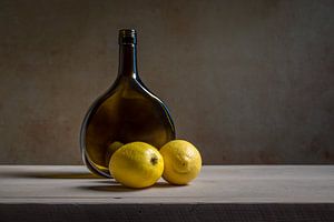 Still life with lemons and a bottle by John van de Gazelle