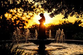 Silhouette woman at sunset by Art & Soul Creations