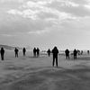 Silhouettes on the beach by Ton de Koning