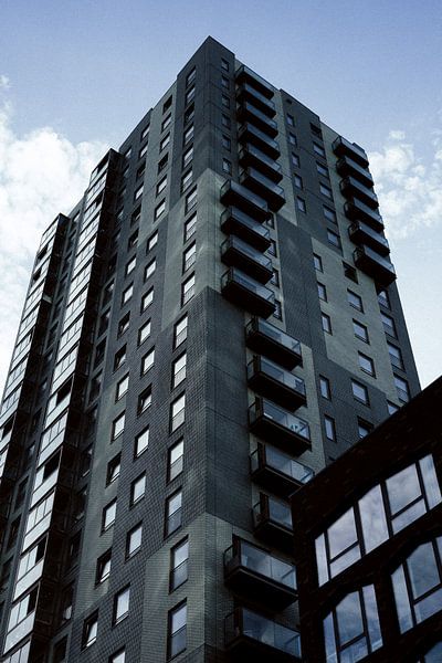 A blue building with blue sky | Amsterdam | The Netherlands Travel Photography by Dohi Media