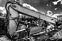 Perspective of a gigantic hydraulic crane on a construction site