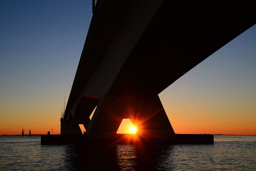 Sunset at the Zeelandbrug bridge by Filip Staes