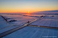 Zonsopkomst in de sneeuw van Martijn de Ruijter thumbnail