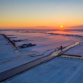 Sonnenaufgang im Schnee von Martijn de Ruijter