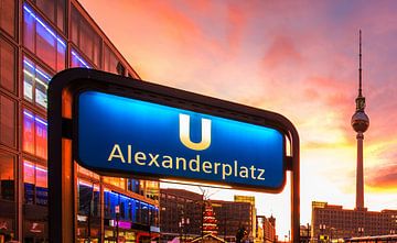 Alexanderplatz subway station with television tower in the sunset