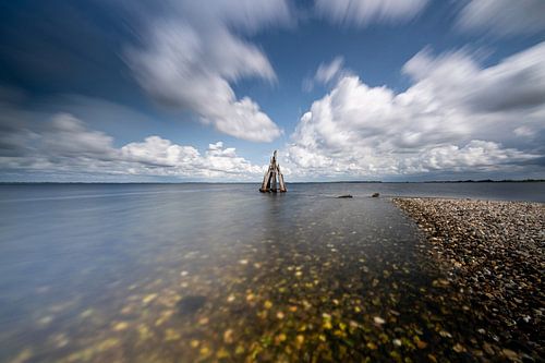 Exaggerating Dutch clouds over lake, Zeeland