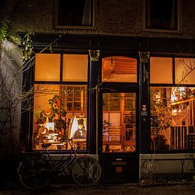 Shop window in typical Dutch street by Rick van de Kraats
