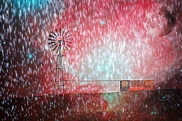 Windturbine waterpomp in de regen mixed media van Werner Lehmann