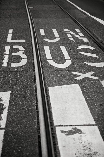 Tram rails and bus lane in Amsterdam by Jeroen Stel