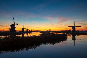De molens van Kinderdijk bij zonsopgang