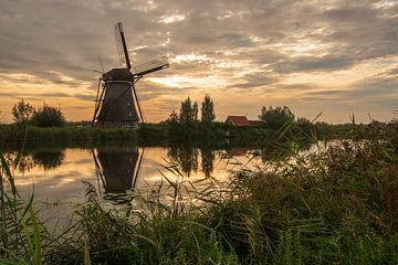 Zonsopkomst Kinderdijk van Lambertus van der Vegt