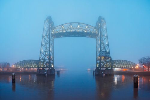 Old railroad bridge De Hef on a foggy morning in Rotterdam