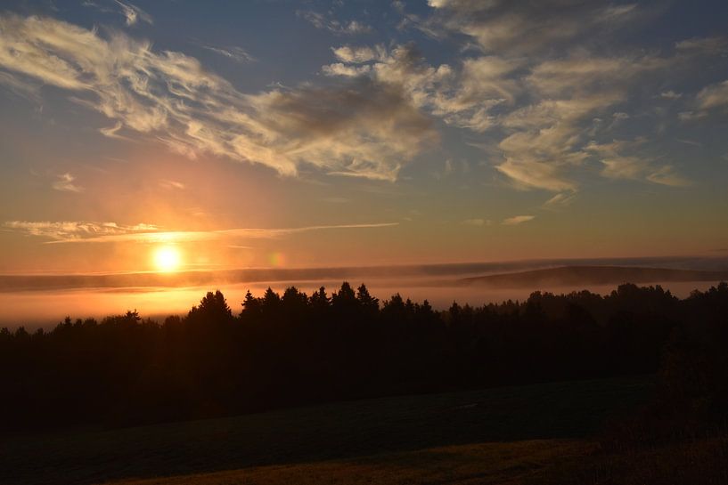 A sunrise on an autumn morning by Claude Laprise