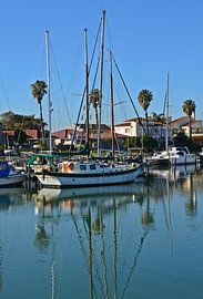 Sailboat in marina in Port Owen by Werner Lehmann