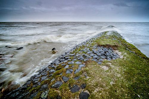 Storm again at stone breakwater in the IJsselmeer