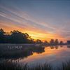 Sunrise over little lake on the Dwingelderveld by Coen Weesjes