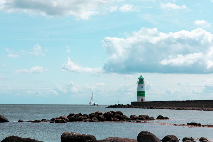 Lighthouse with sailboat by Sophie Luther