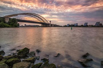 Brienenoord bridge at sunset by Ilya Korzelius
