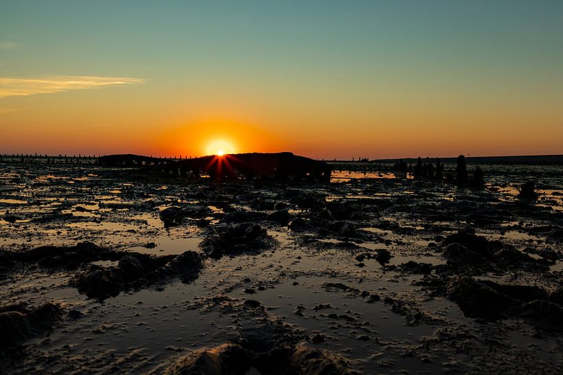Wadden Sea, sunrise at Paesens Moddergat (Shipwreck of Wierum) by Gert Hilbink